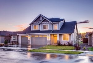 Locksmith Services in SW OKC, residential house with front garage and large windows. 